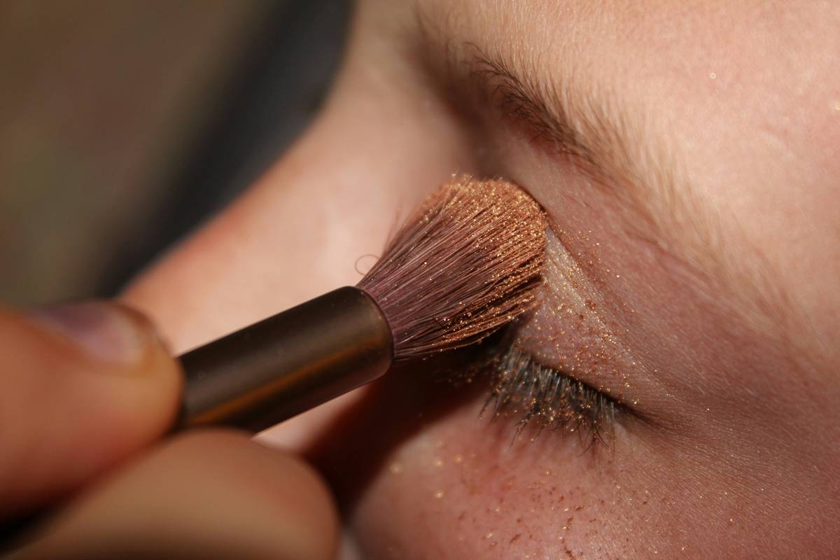 Flawless glam makeup application showing layered foundation and luminous cheekbones with ultimate makeup glam tips